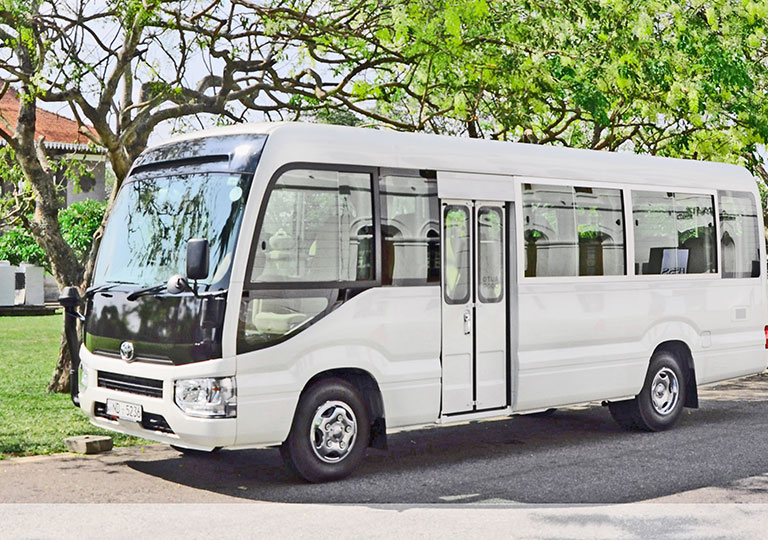 Toyota Coaster luxury 29 seater bus at Malkey Rent A Car Colombo