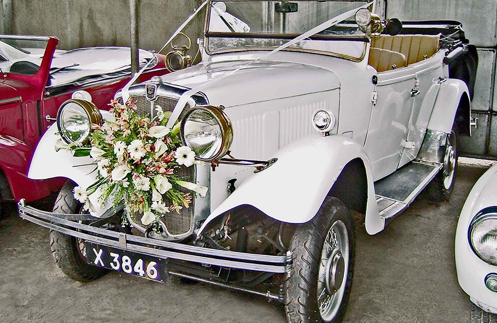 Morris 10 white vintage open top tourer at Malkey Rent A Car Colombo
