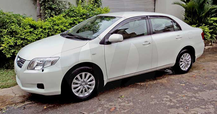 Toyota Corolla Axio 141 sedan for hire at Malkey Rent A Car Colombo