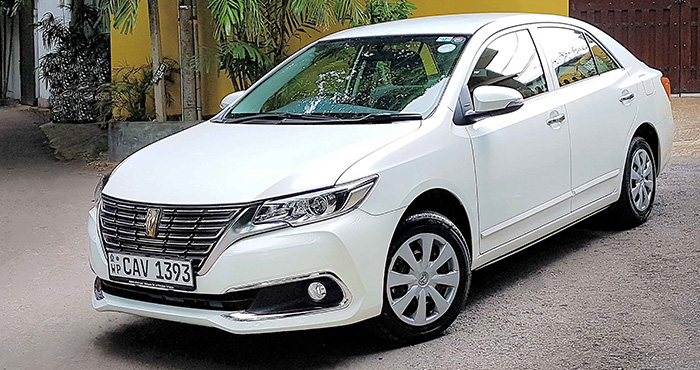 Toyota Premio sedan for hire at Malkey Rent A Car Colombo
