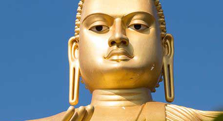 Buddha statue at Dambulla rock cave temple in Sri Lanka
