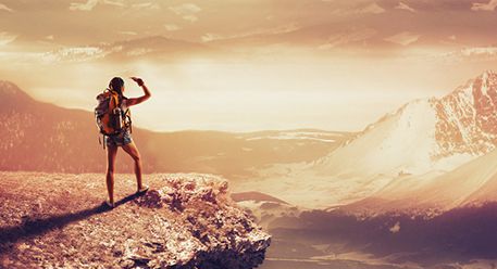 A person looking at mountain scenery