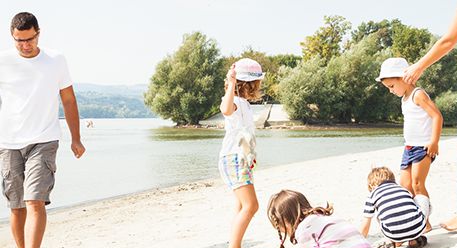 A family having fun at the seaside 