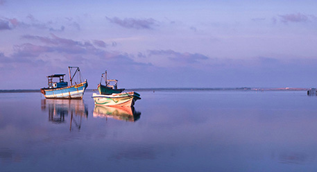 Traditional fishing boats on the water