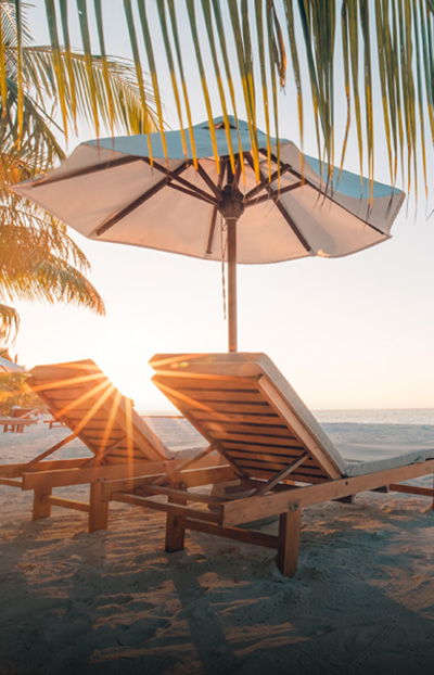 Sun lounges on the shore 